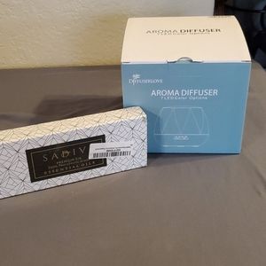 Aroma diffuser with essential oils
